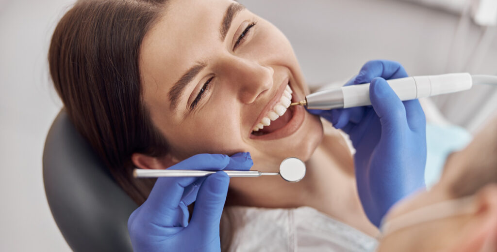 woman dentists process of getting veneers