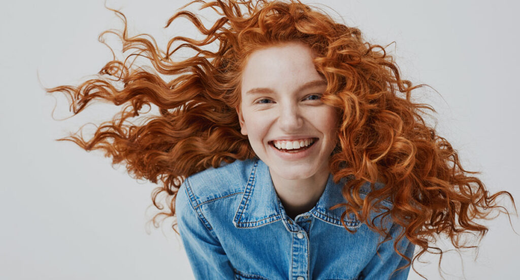 woman smiling monthly payment dentists benefits