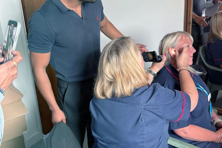 Woman doing an opperation demonstration for clearcare